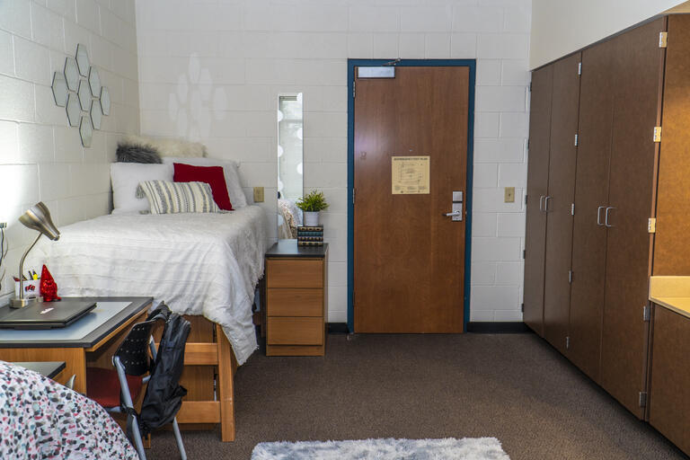 View of a dorm room looking towards the door