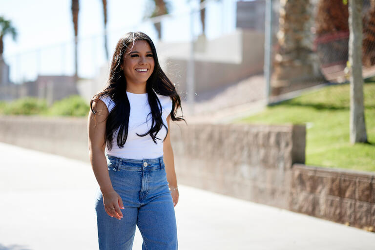 Jennevee Morales walks on campus